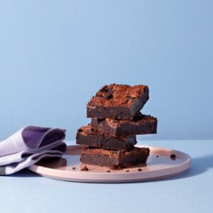 Gluten-free Choc Chunk Brownie stack with dark chocolate pieces | Cake Club.