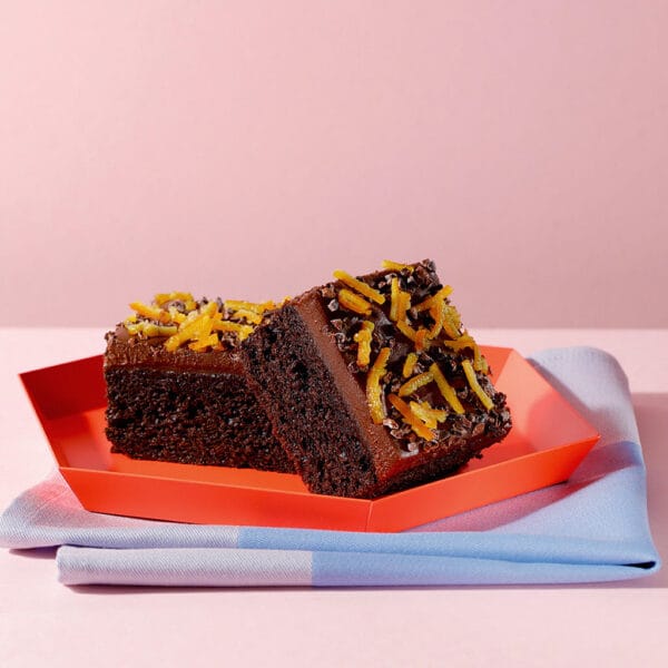 Two slices of our delicious vegan chocolate joy traycake.