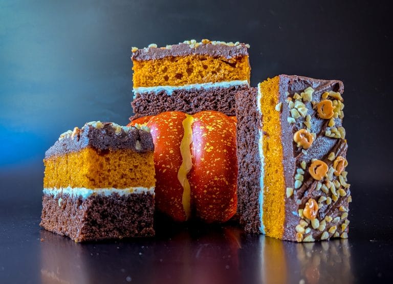 Innovative chocolate, pumpkin and praline traycake, and slices with bold flavours and colours, showing how a good cake supplier keeps a coffee shop range fresh with new ideas.